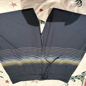 Travis Mathew Navy and Gold Board Shorts